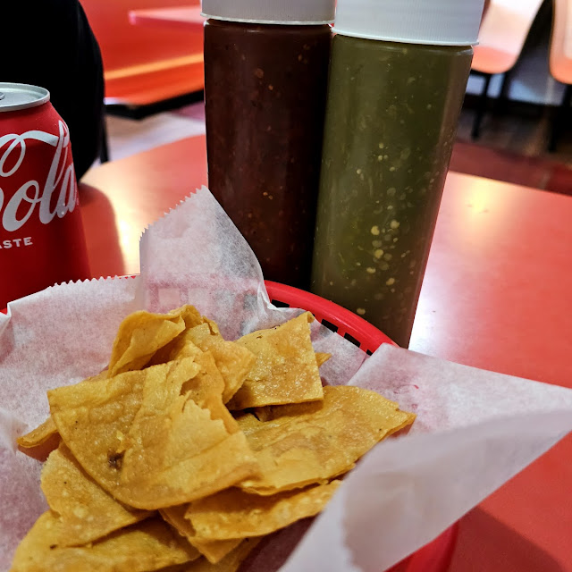 Tortilla Chips with Salsa Bottles