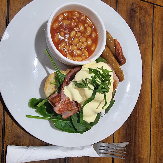 Eggs Benedict Half with Beans and Sausage